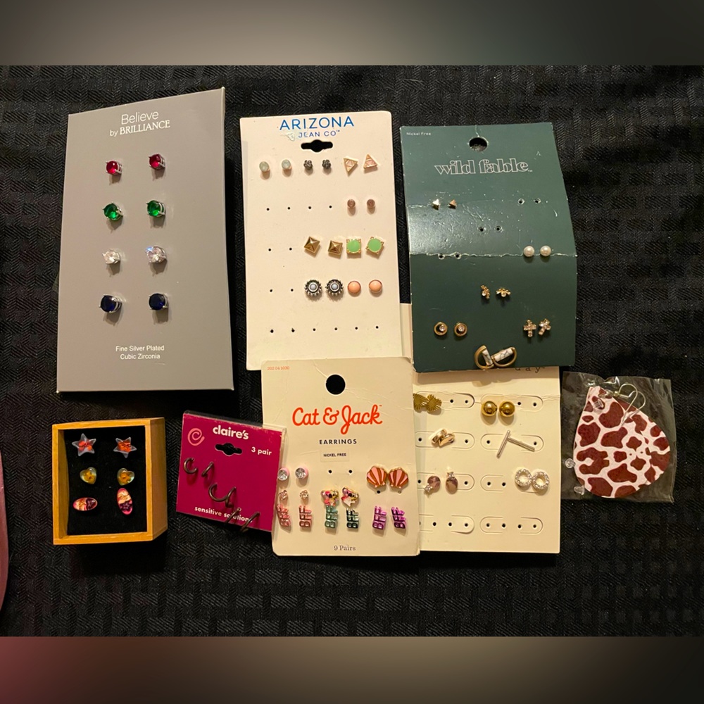 35 + pairs of new stud earrings. Planning on putting each pair in its own bag.